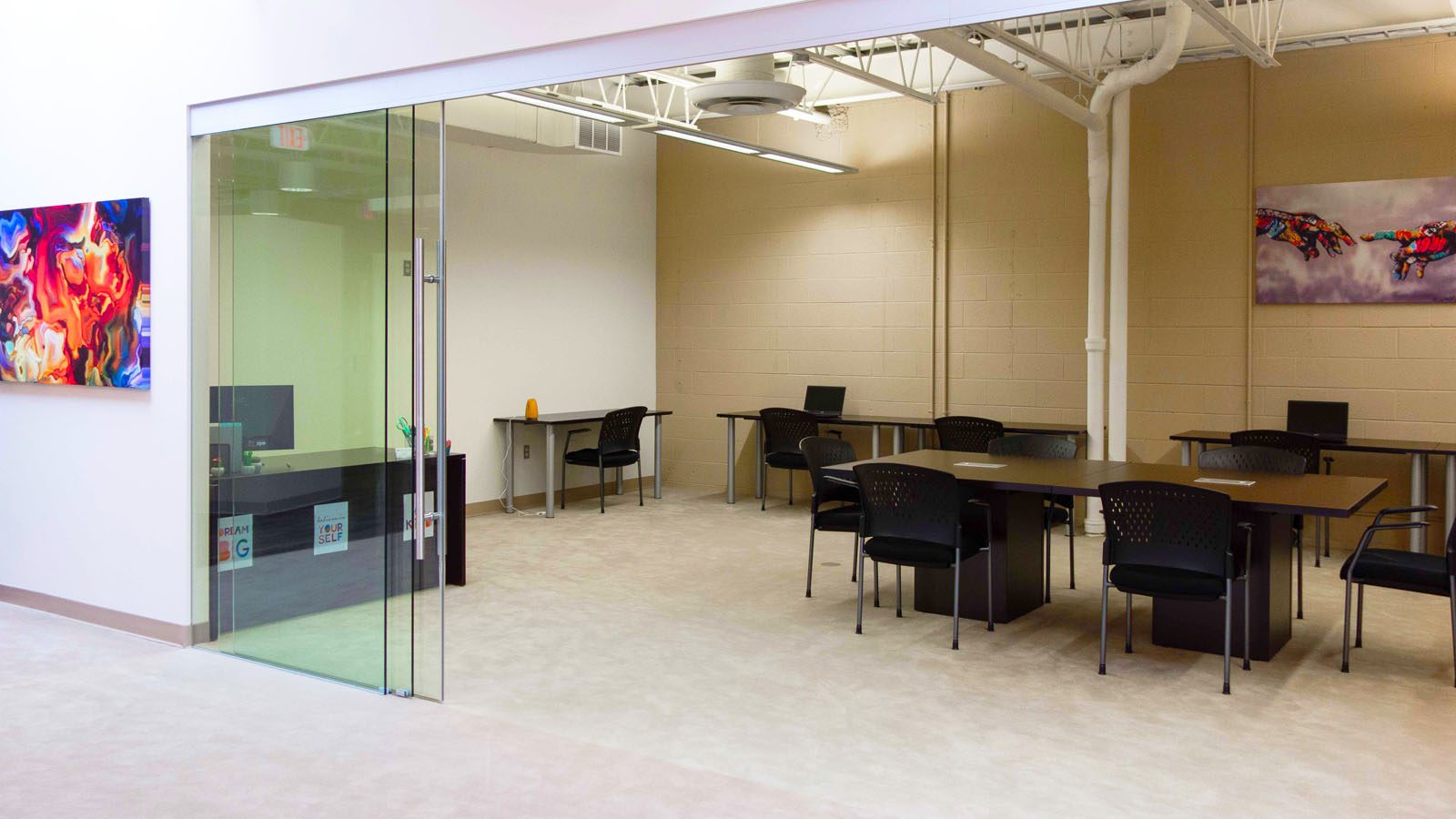 Interior view of Sandstone Care's Reston Rehab Center, featuring a well-lit and contemporary group therapy room