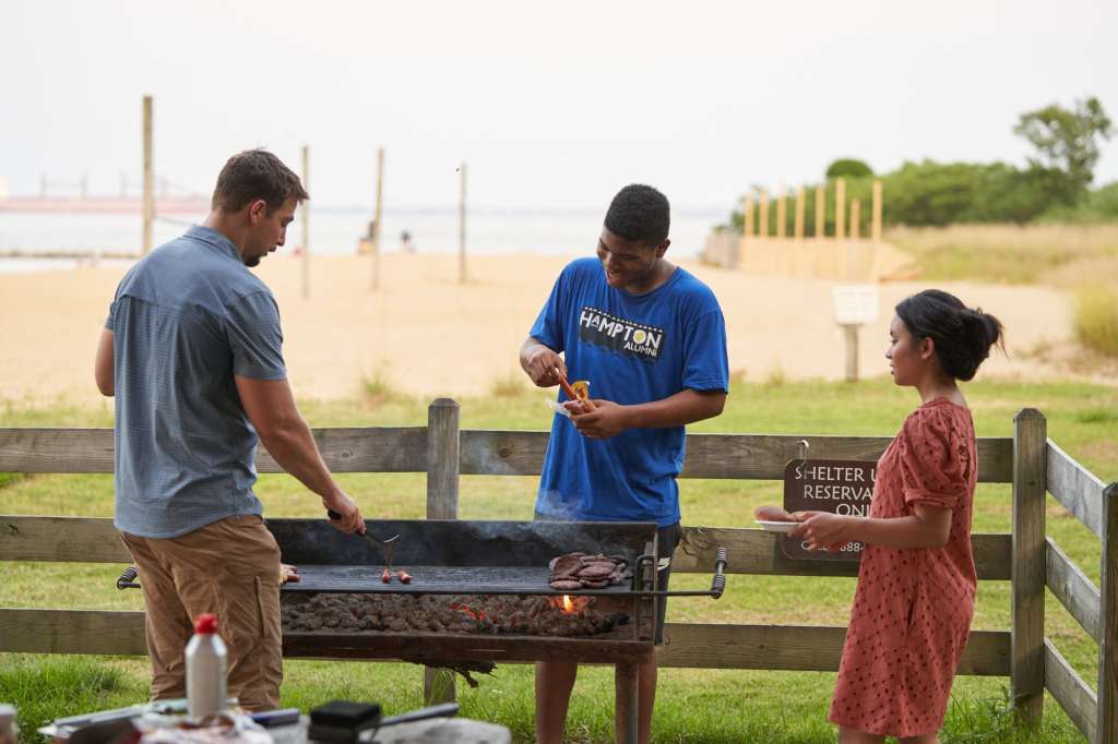 Teens participating in outdoor barbecue event at Chesapeake teen rehab center