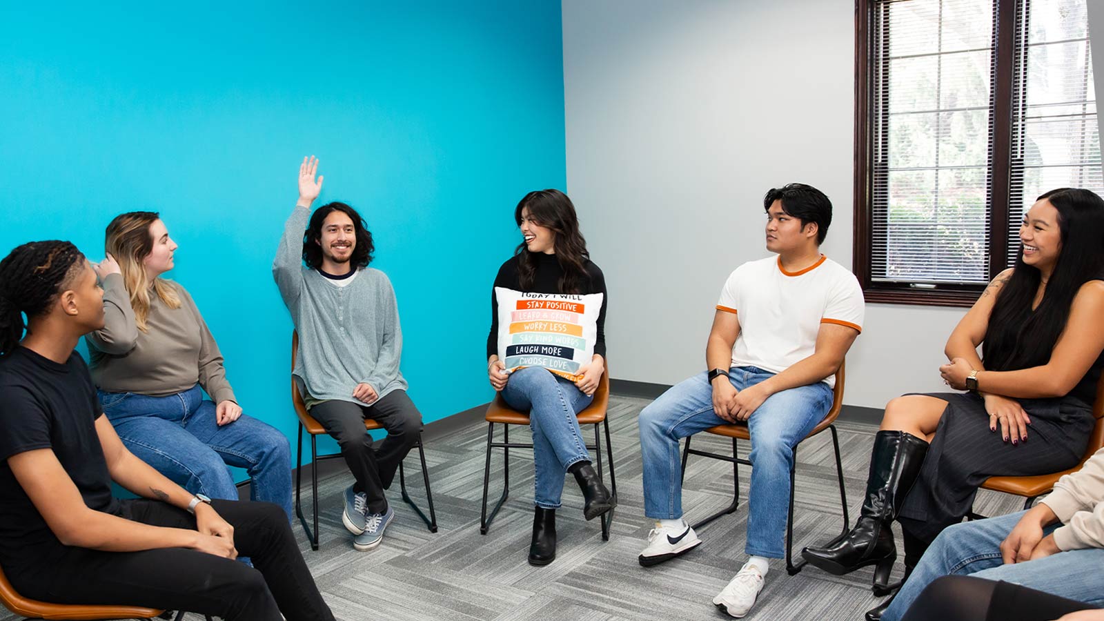 A group therapy session with diverse participants.