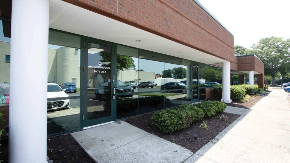 VA Beach Mental Health & SUD Treatment Center for teens & young adults | reflection of parked cars in glass window