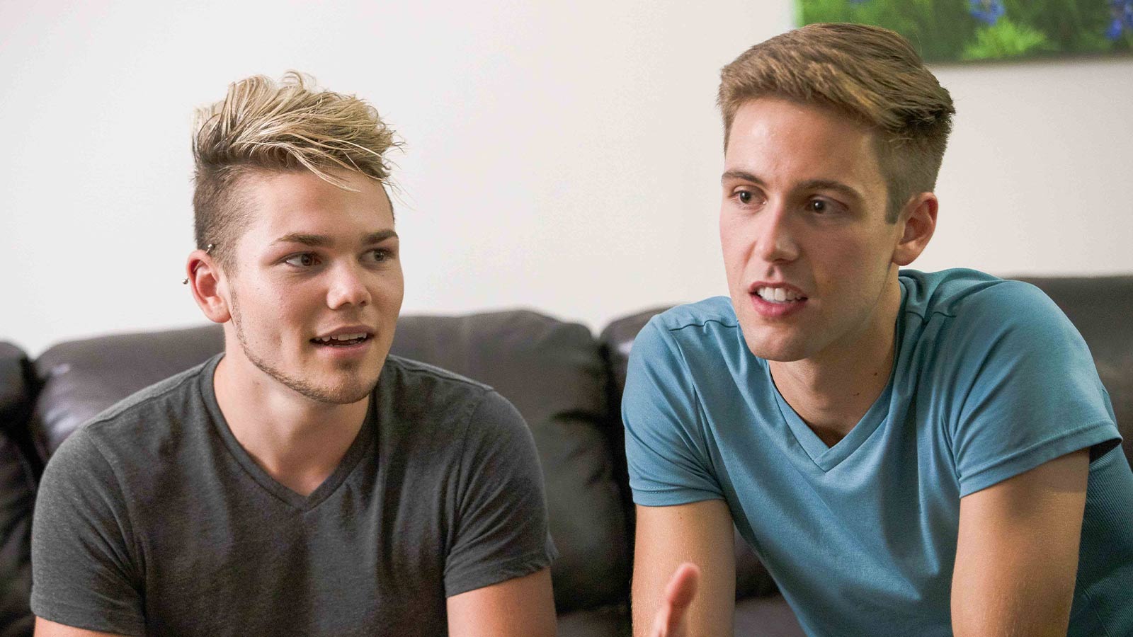 Two men engaged in a discussion.