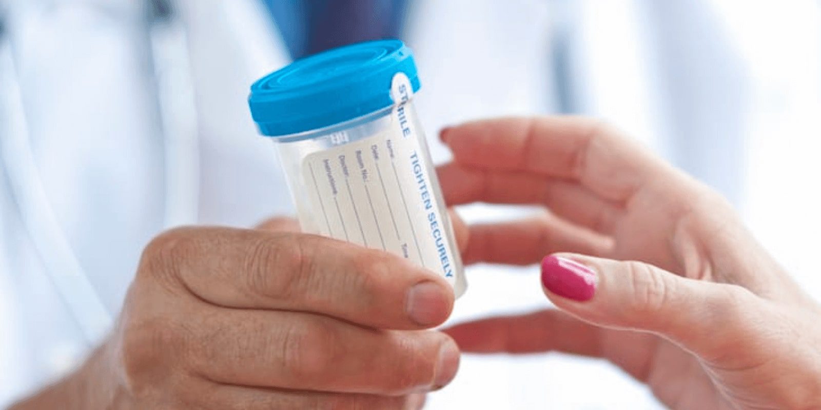 hands exchanging a medical bottle