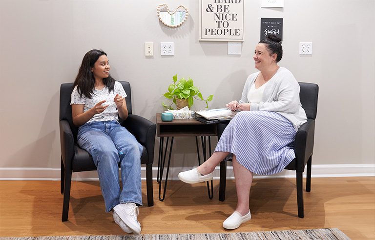 One on One Happy Therapist Discussion at Center