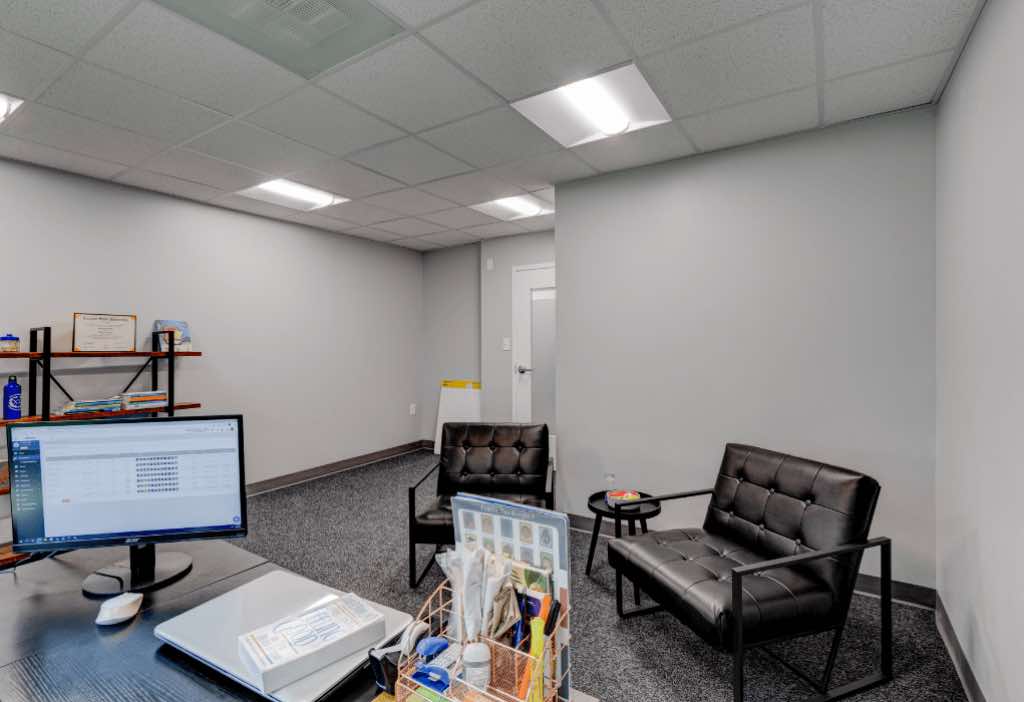 Towson rehab center individual therapy room with two chairs across from a desk