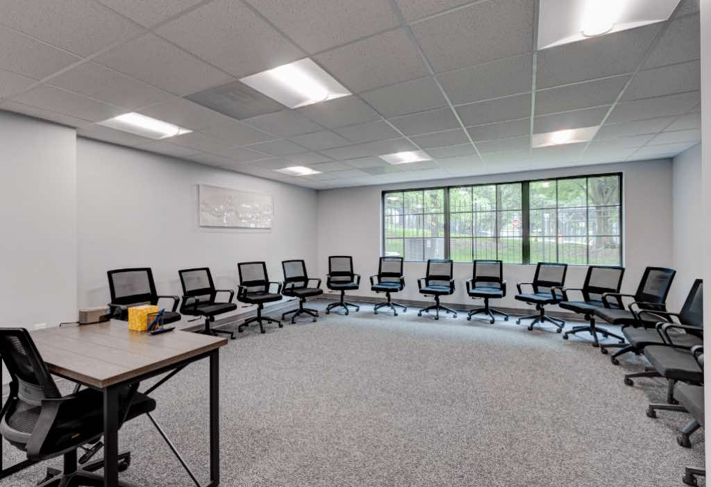 Towson rehab center group therapy room with a circle of chairs