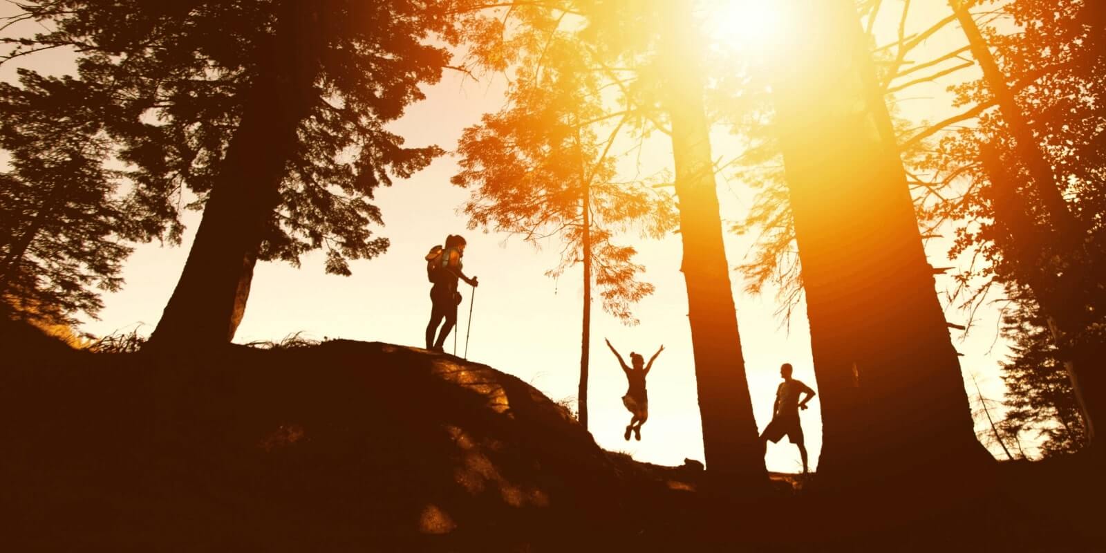 Teens hiking in the sunset