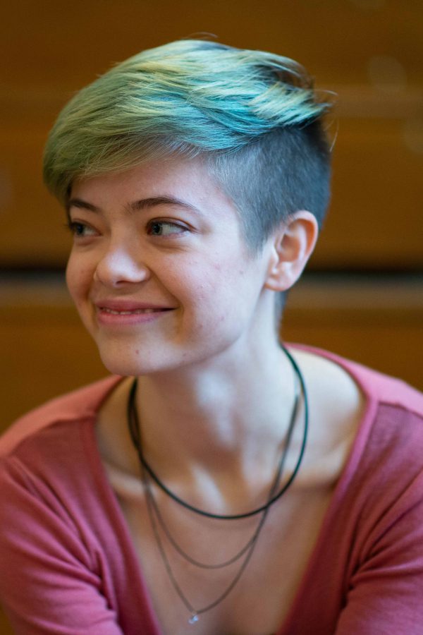 Smiling teen with colorful hair