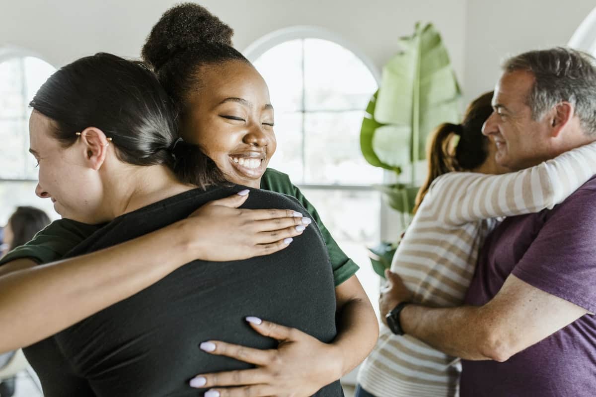 Diverse people in a support group session