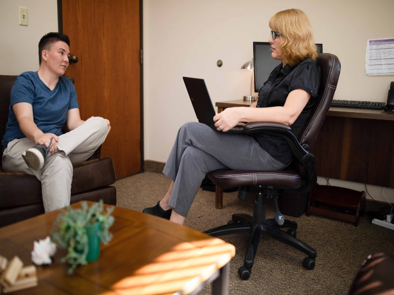 Counselor talking to a patient