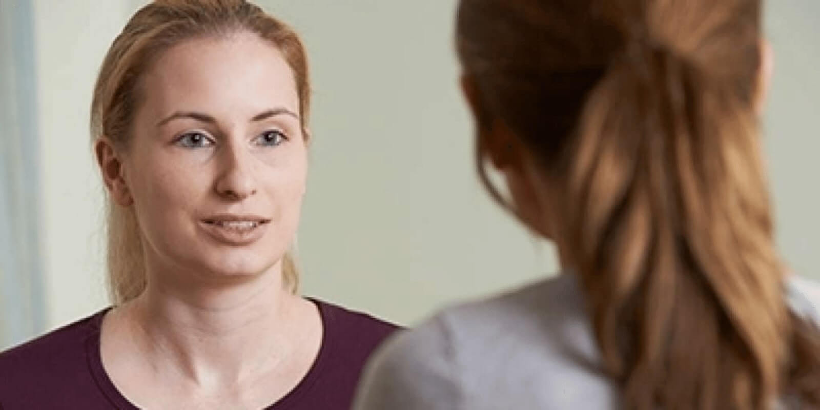 Young female during one on one counseling session with her therapist