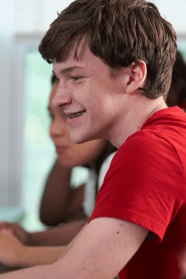 A smiling teenage boy