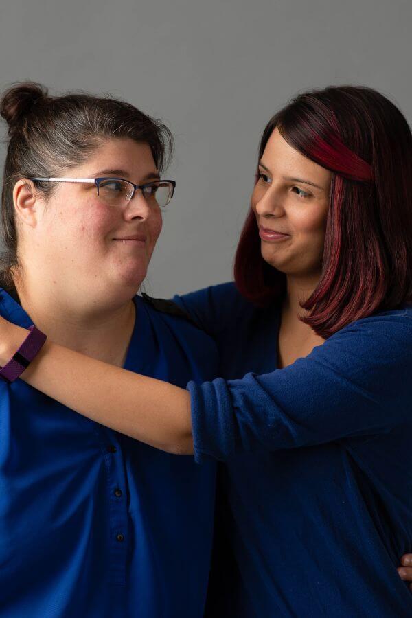 mother and daughter embracing each other