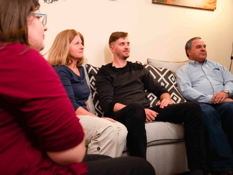 Young adult and his parents in a Family Therapy session