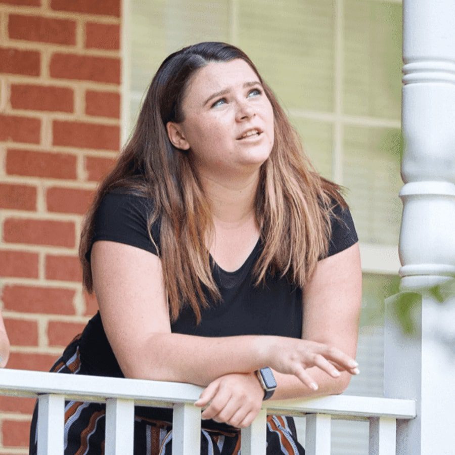 A female teen looking up