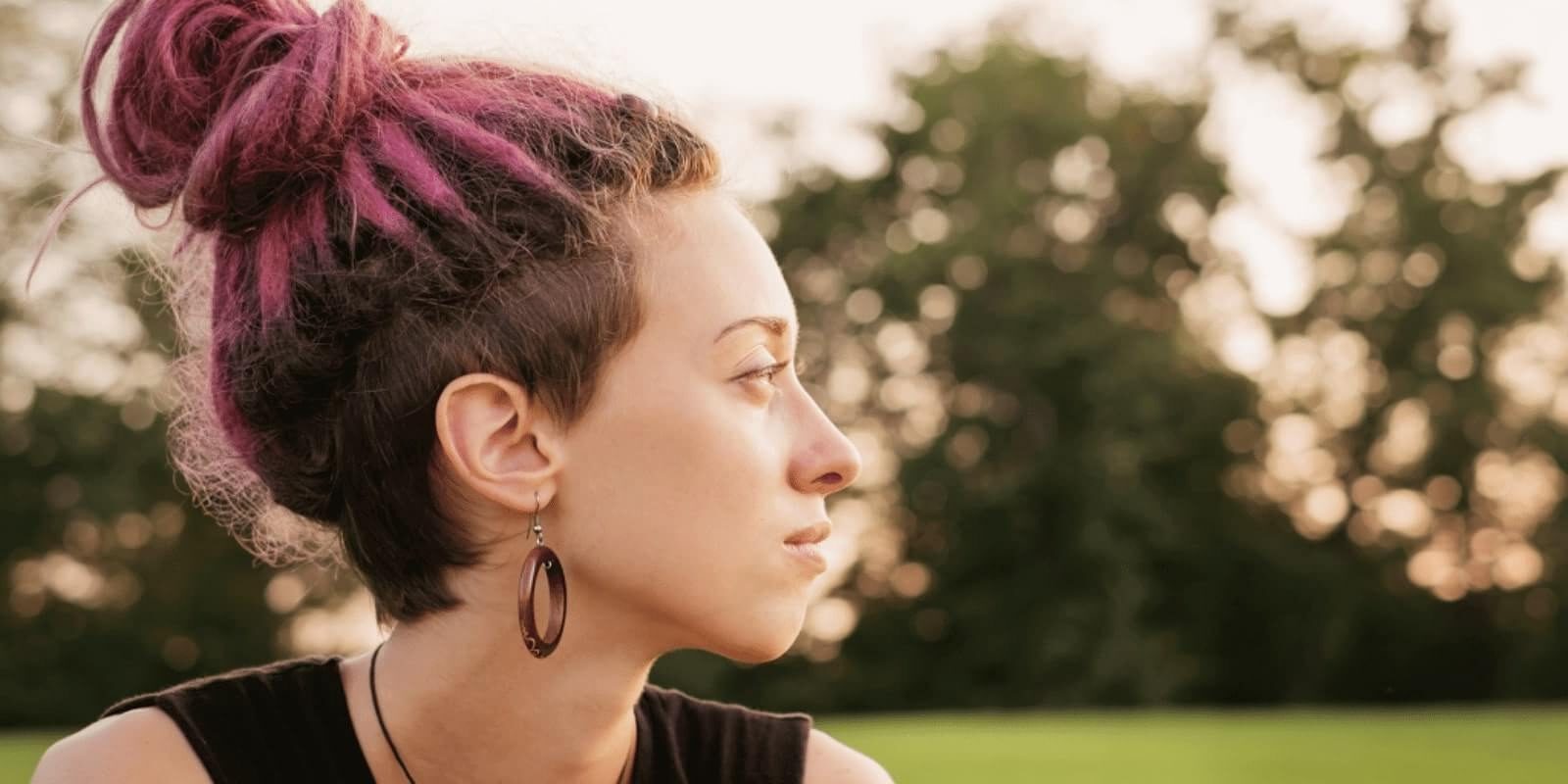 A female young adult looking away