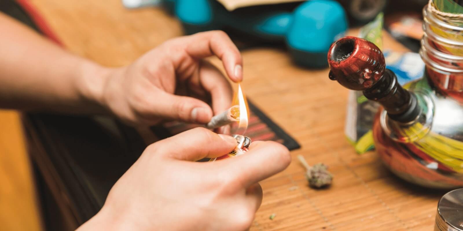 Somone lighting up a joint
