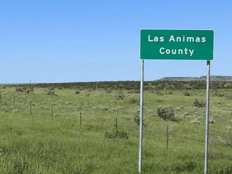 Las Animas County post sign in the road