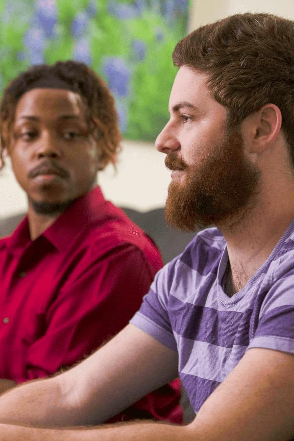 two men sitting in therapy