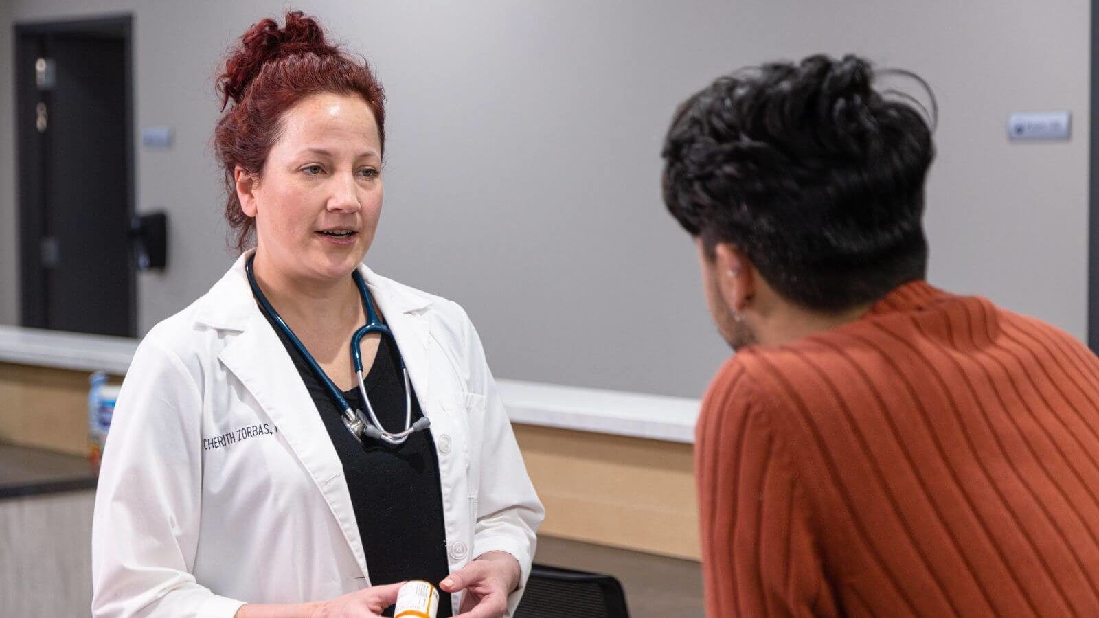 A clinician talking to the patient at Sandstone Care Virginia Detox Center