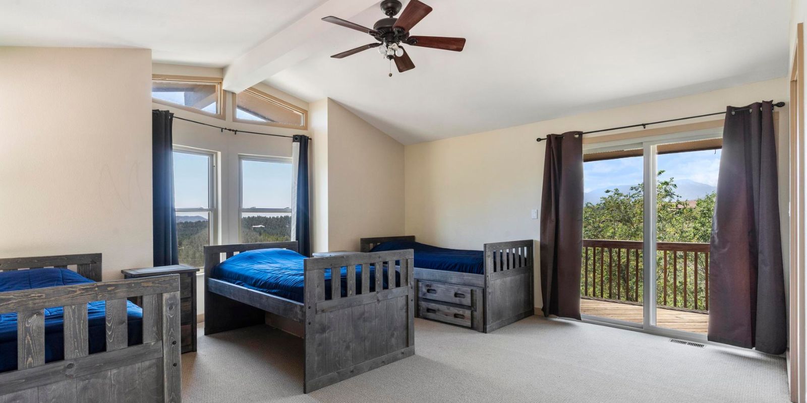 shared bedroom with 3 beds