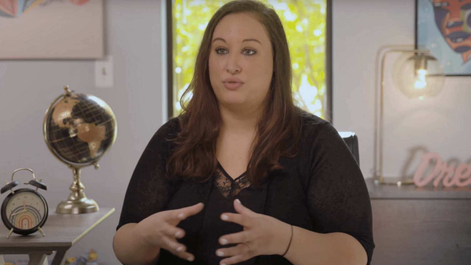 Woman explaining treatment at Sandstone Care